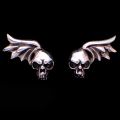 Boucles d'oreilles cr�nes ail�s