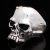 Skull ring with a bullet